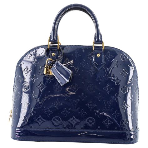 alma pm leather handbags